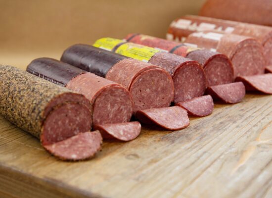 summer sausage on a cutting board